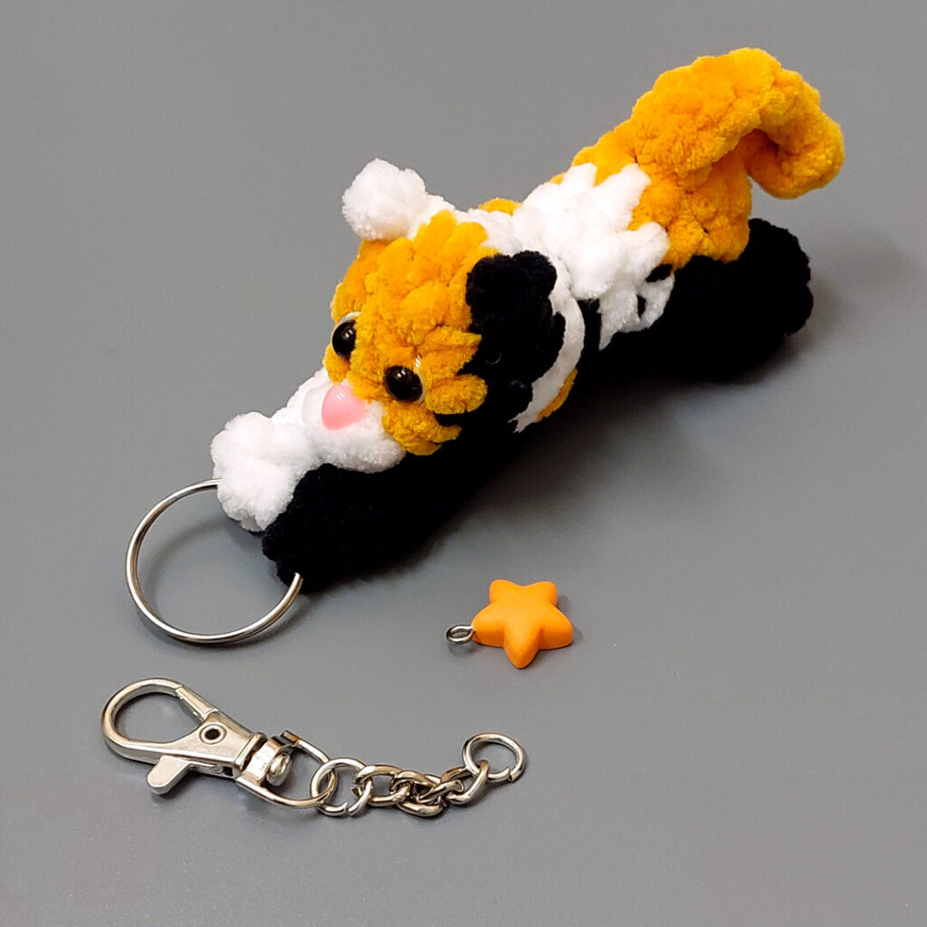 Make This Adorable “Flying Tiger” Keychain: Free No-Sew Plush Crochet Pattern