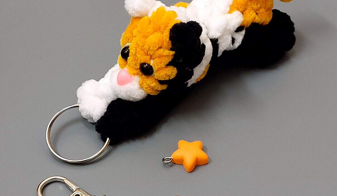 Make This Adorable “Flying Tiger” Keychain: Free No-Sew Plush Crochet Pattern